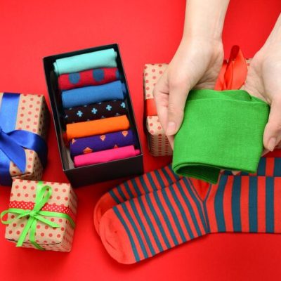 colorful collection cotton socks as gift woman hands 188078 20979